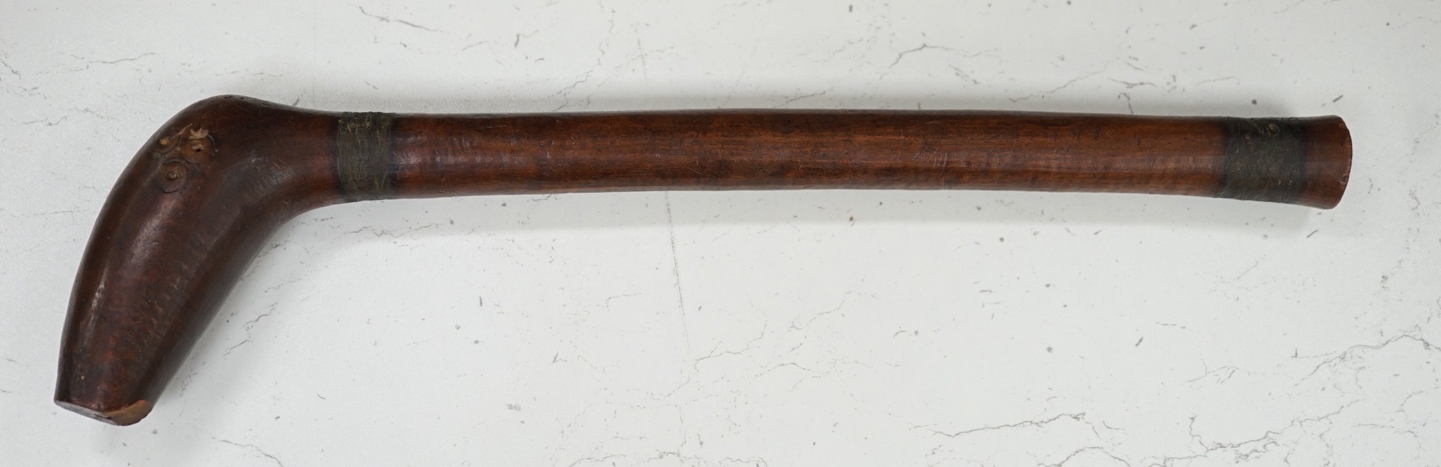 A Polynesian wood throwing club, 40cm tall